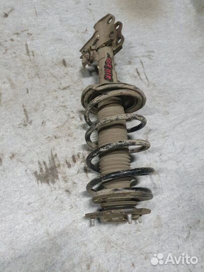 Стойка подвески передняя правая Geely Emgrand Ec7