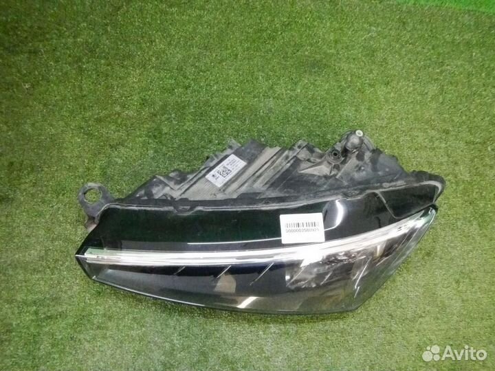 Фара левая Skoda Rapid