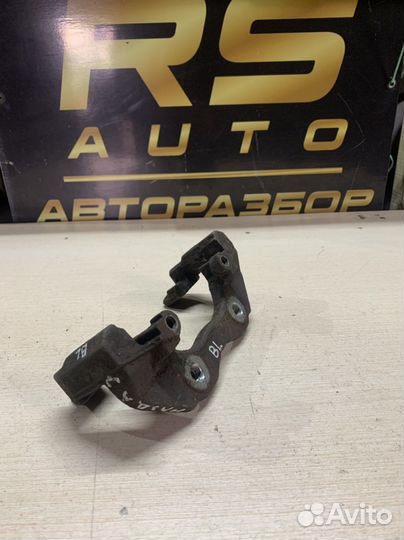 Скоба переднего суппорта Mazda 3 bk bl