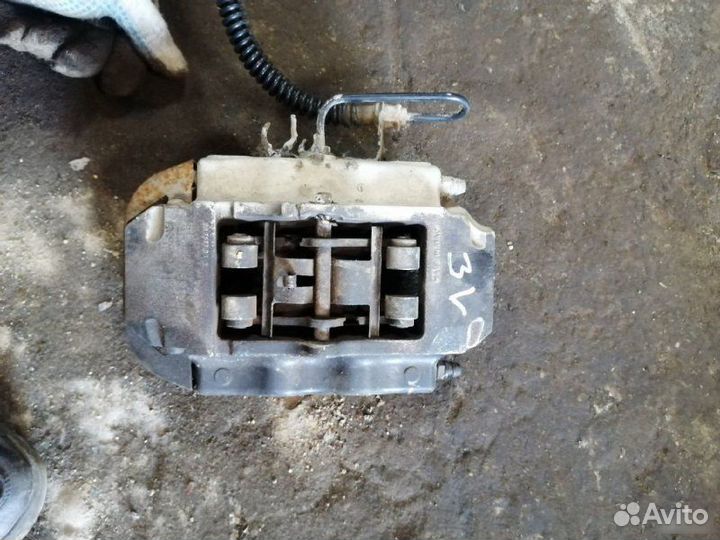 Суппорт тормозной задний левый Porsche Cayenne 955