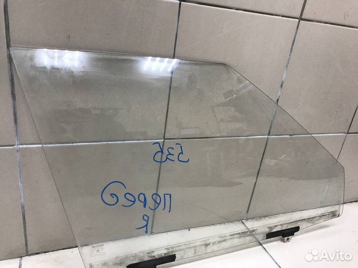 Стекло двери передней правой Toyota Corolla
