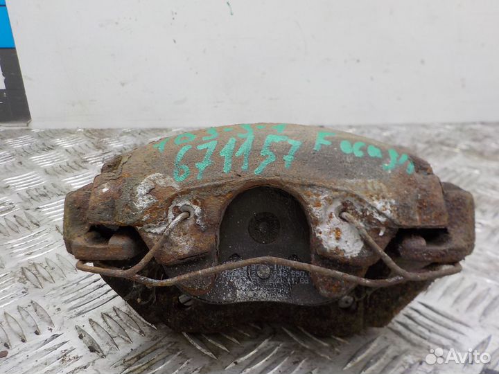 Суппорт тормозной передний левый Ford Focus II 200