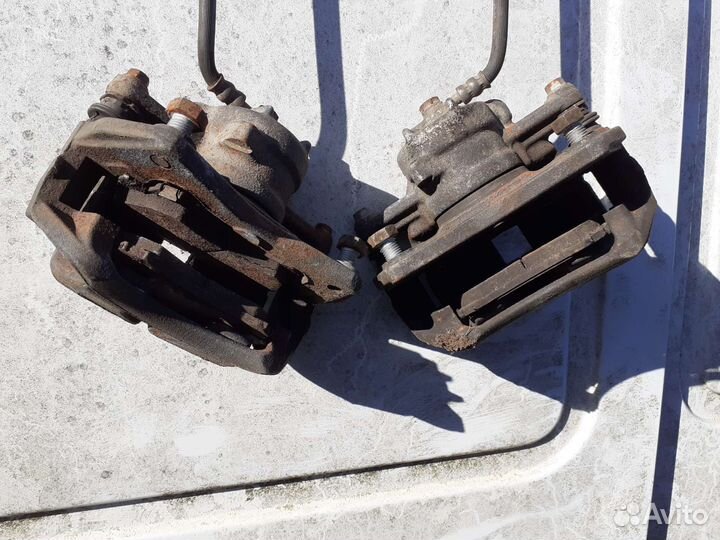 Суппорт тормозной передний Mitsubishi Colt (Z3)