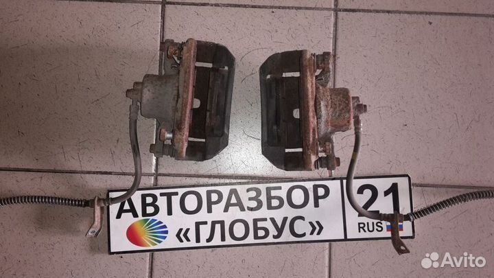 Суппорт тормозной передний Kia Cerato 3