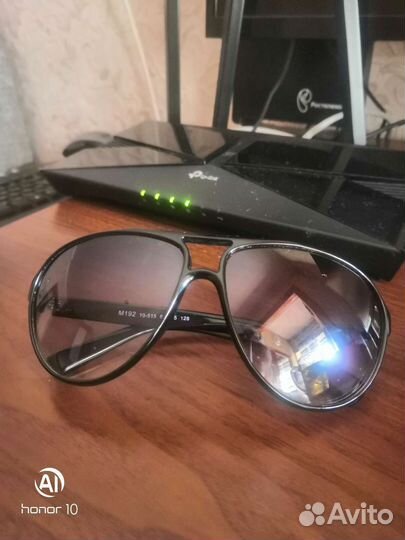 Мужские и женские солнцезащитные очки