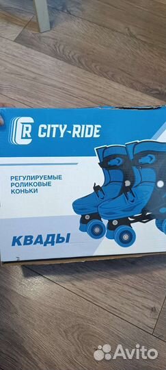 Роликовые регулируемые коньки