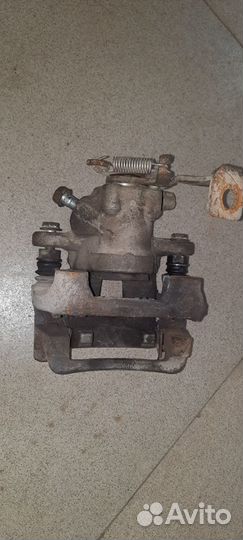 Продам задний правый суппорт на toyota corolla 07