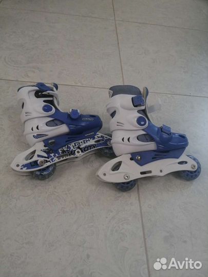 Роликовые коньки