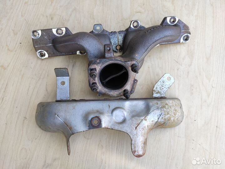 Коллектор выпускной A20NFT Opel Astra J Insignia