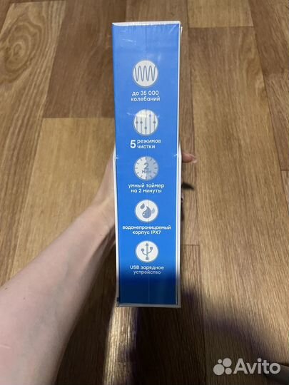 Электрическая зубная щетка