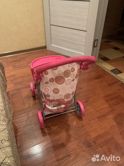 Игрушечная коляска для кукол