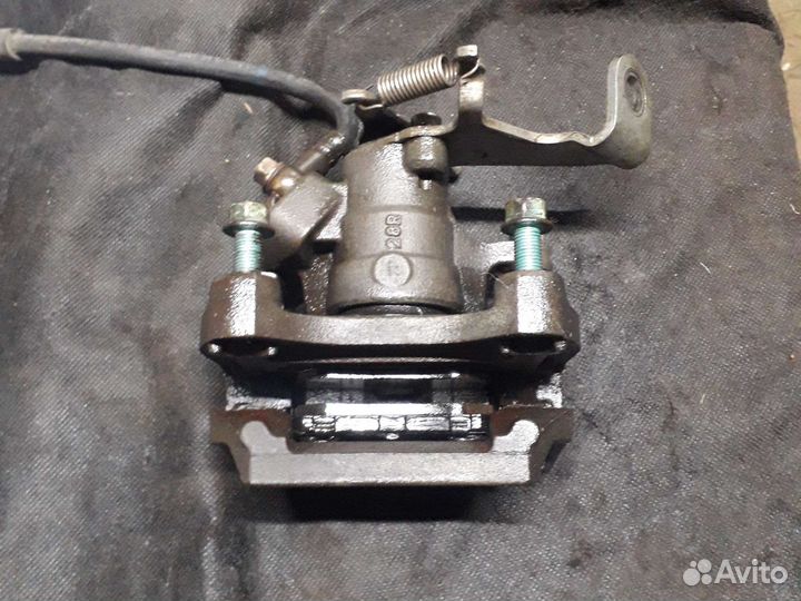 Суппорт задний Mazda 6 gj