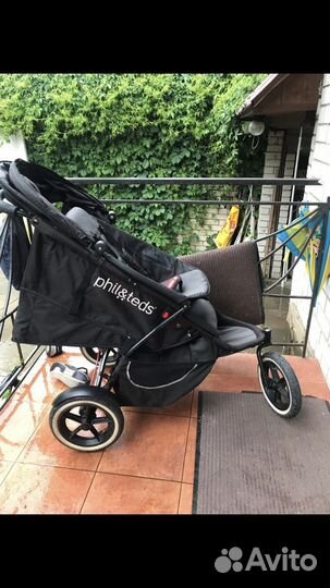 Коляска для погодок