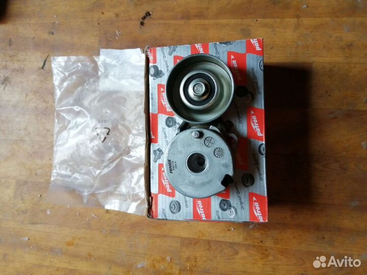 Ролик с натяжителем ремня генератора