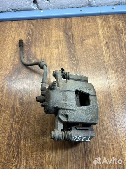 Суппорт тормозной передний левый Chevrolet Aveo