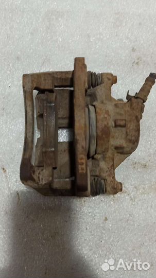 Суппорт левый Chery Tiggo t11