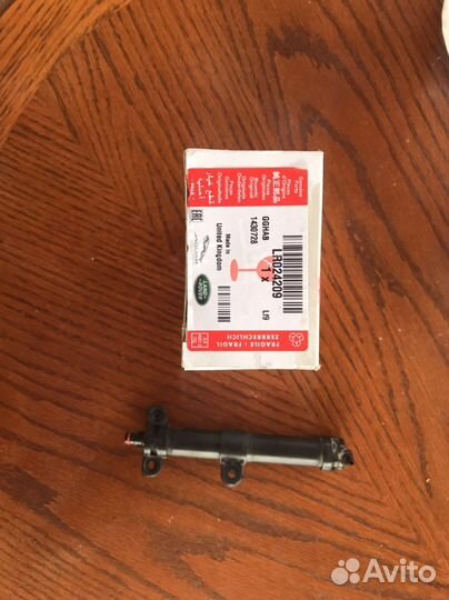 Форсунка фары Range Rober Evogue правая