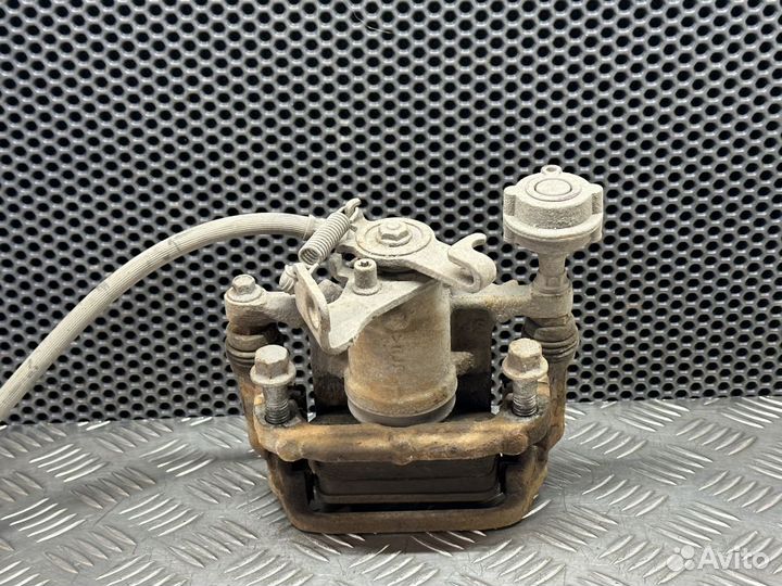 Суппорт задний правый Chevrolet Cruze J300