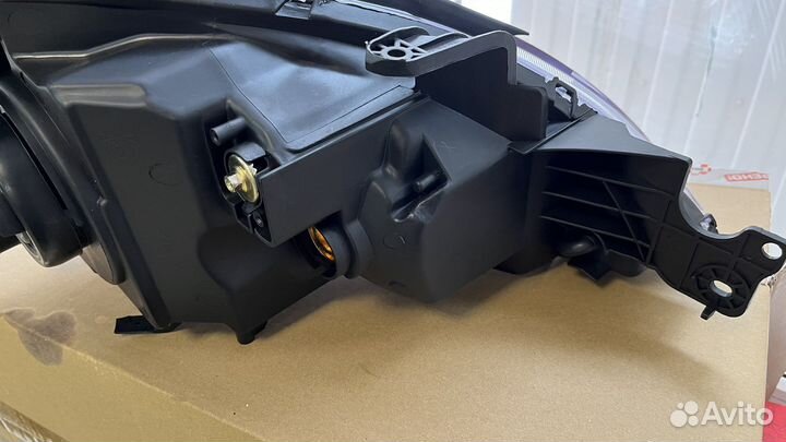 Фара mitsubishi lancer 03-07