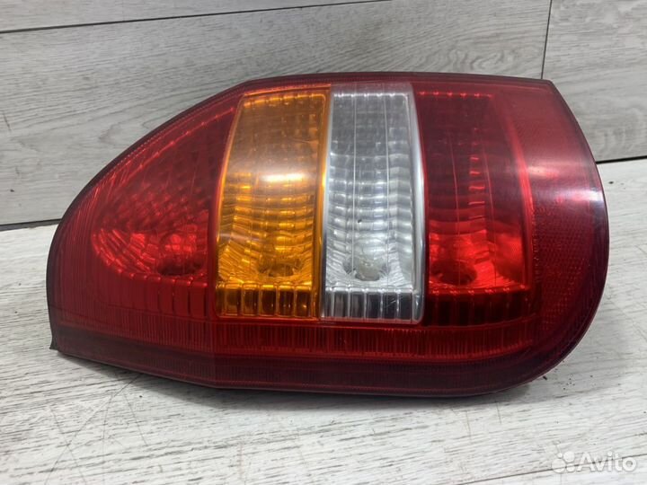 Фонарь задний левый Опель