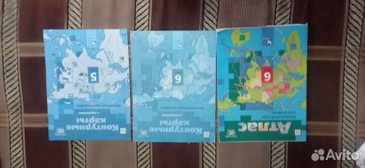 Учебник и рабочие тетради по географии