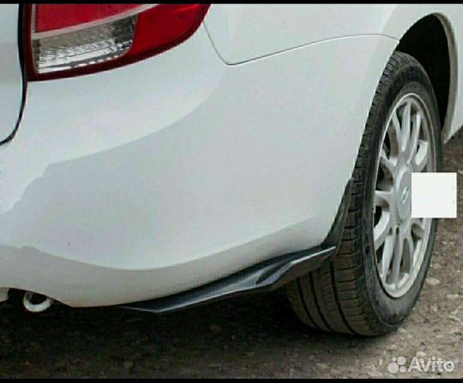 Клыки заднего бампера Лада Гранта