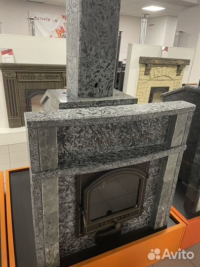 Чугунная печь для бани в облицовке