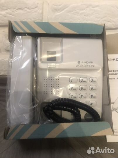 Проводной стационарный телефон новый