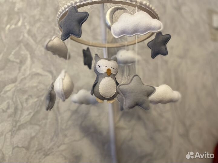 Музыкальный мобиль на кроватку