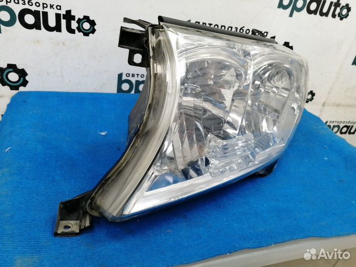 Фара галоген левая 81170-60C51 Toyota Land Cruiser