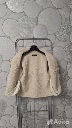 Жилетка меховая женская