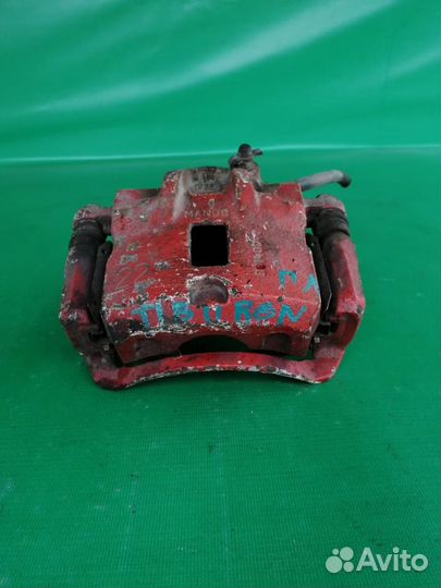 Суппорт тормозной перед левый Hyundai Tiburon