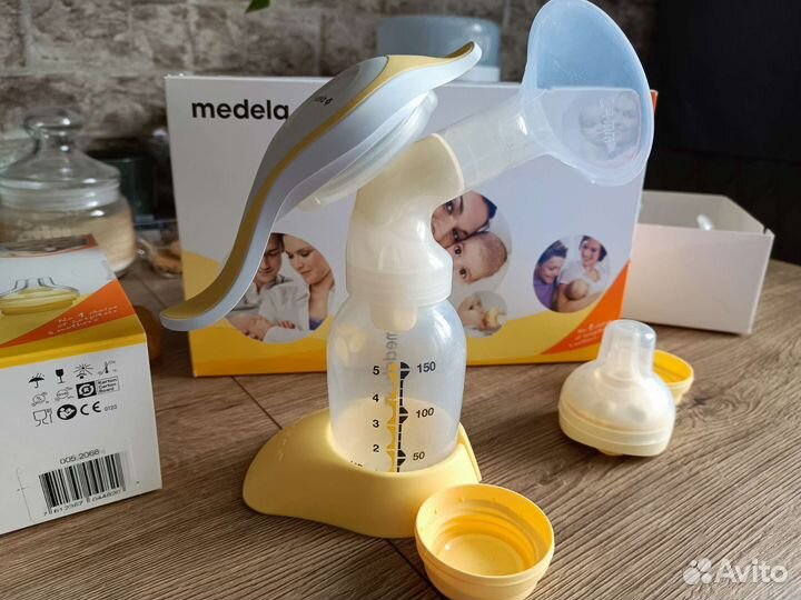 Молокоотсос medela ручной