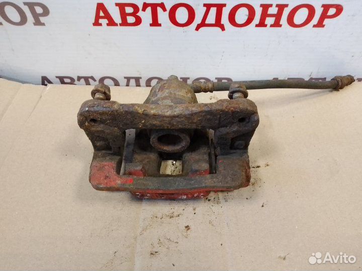 Суппорт тормозной задний левый Hyundai Santa Fe