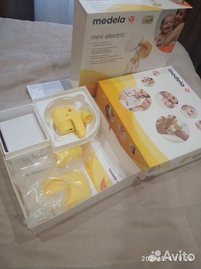 Молокоотсос Medela mini electric