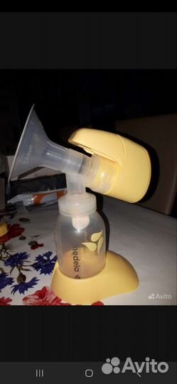 Молокоотсос medela электрический
