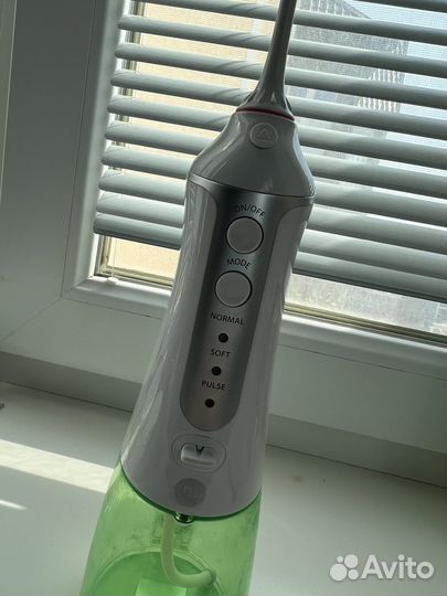 Электрическая зубная щетка