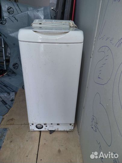Стиральная машина с верт. загрузкой Ariston 84
