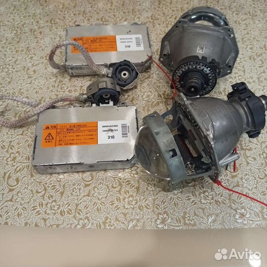 Биксеноновые линзы hella для Субару Аутбек 4