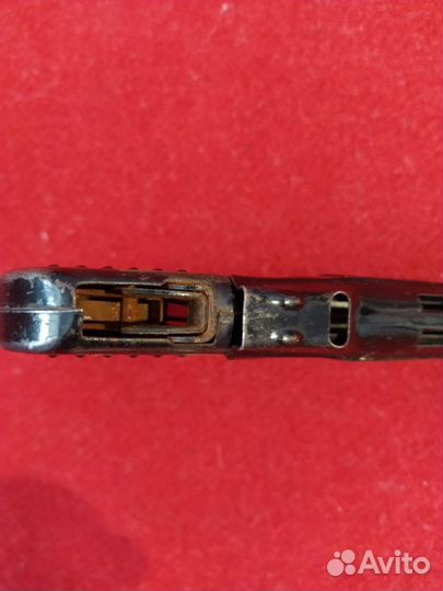 Игрушечный металлический пистолет