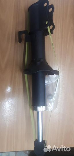 Амортизатор перед правый mazda demio 98