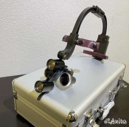 Налобный осветитель