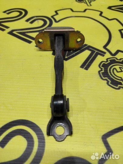 Ограничитель двери задний правый Nissan Primera