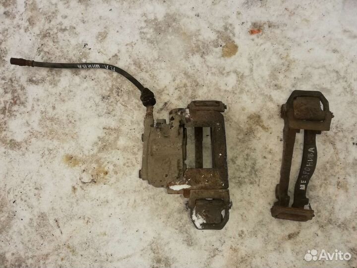 Суппорт тормозной передний Нива Шевроле