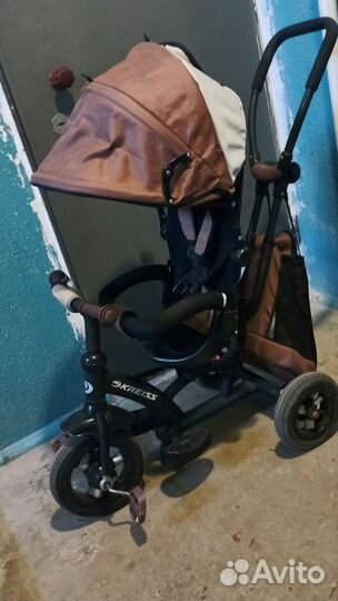 Велосипед коляска с родительской ручкой