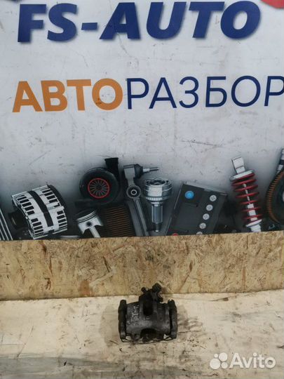 Суппорт тормозной задний правый Ford Focus 2 купе