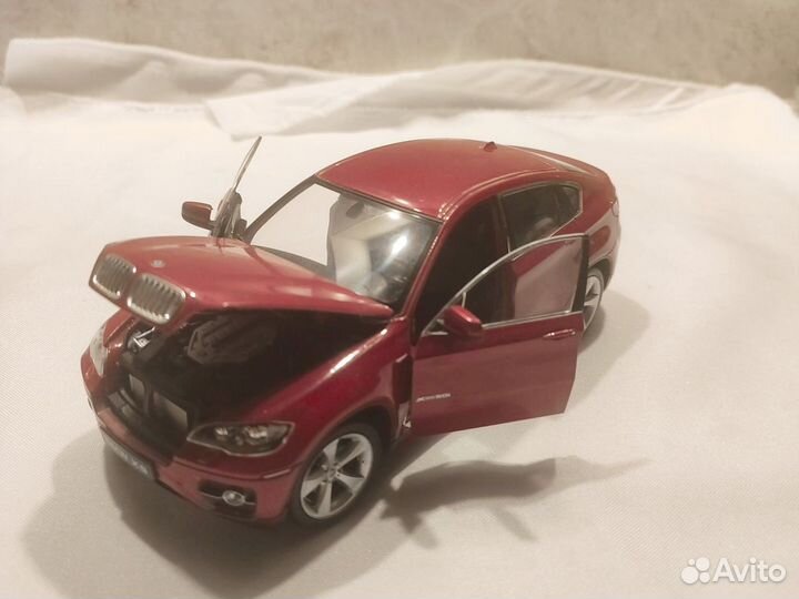 Модель BMW x6 1:24 welly