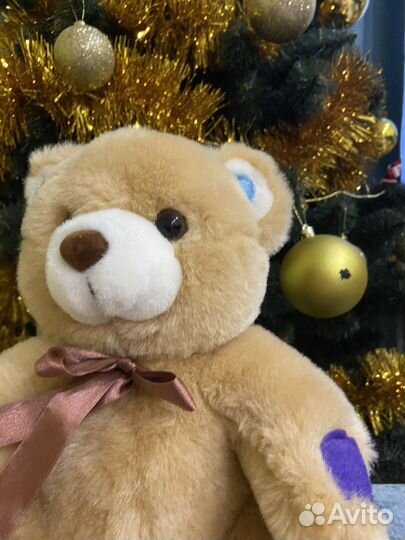 Интерактивный мишка учит цветам