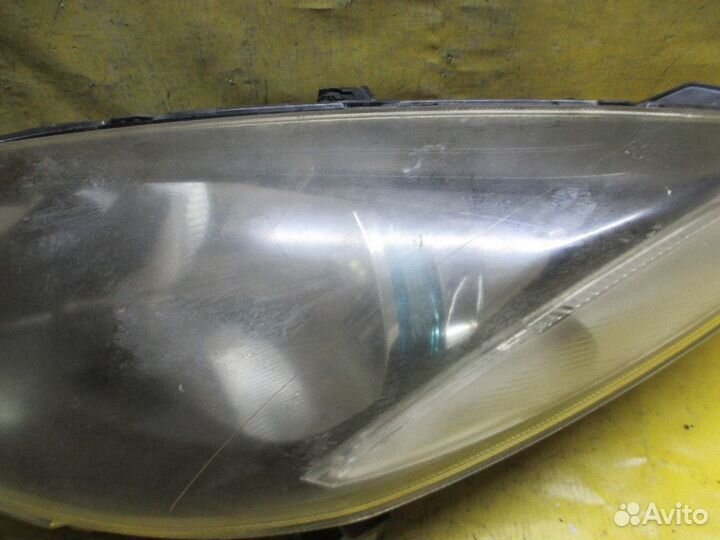 Фара левая Mazda Demio dejfs