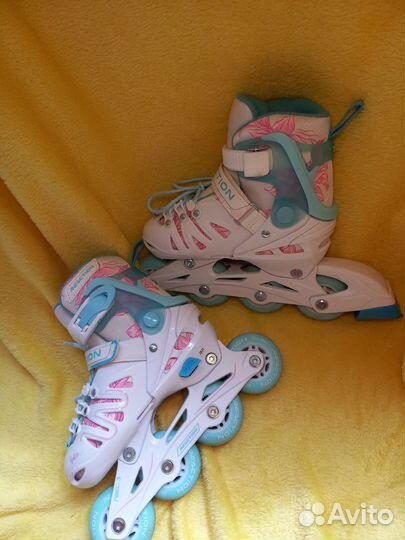 Коньки роликовые
